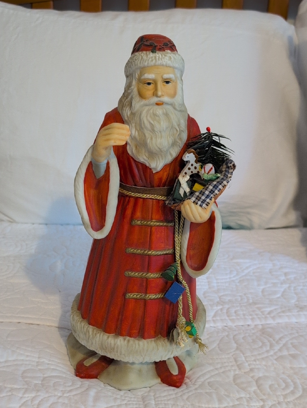 Classic Red Santa Holiday Figurine with Toy Basket Musical.